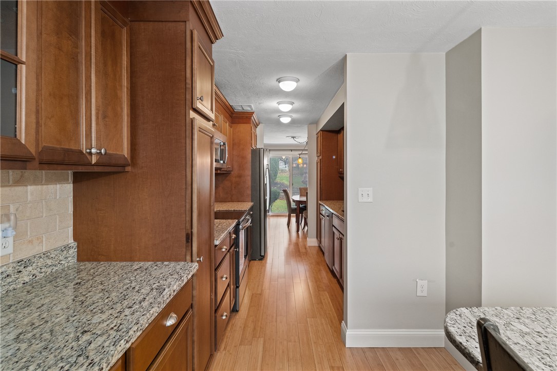 2970 Mendon Road, Unit 5 Cumberland, RI 02864 - Photo 4 of 26 Custom Cabinetry Granite Countertops