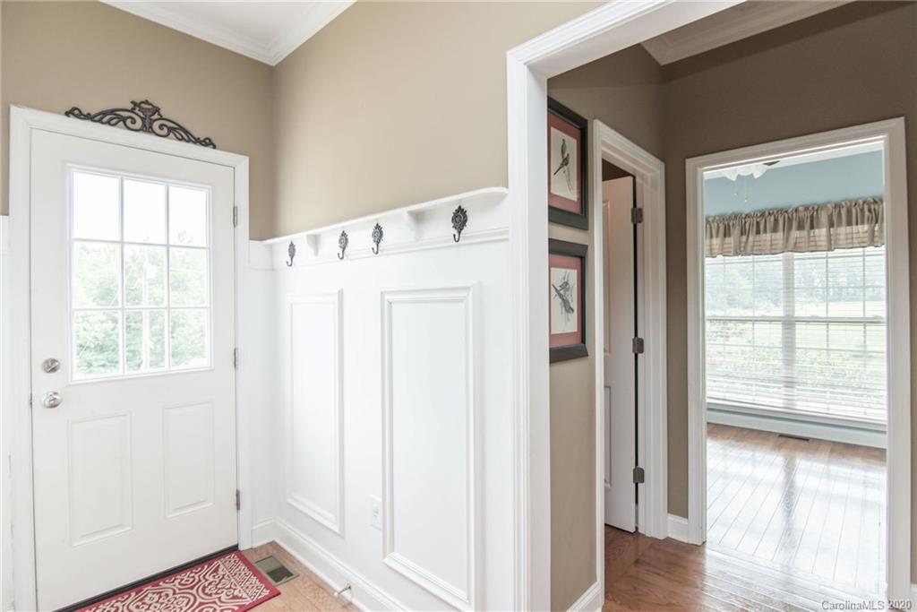 725 Hawley Road McConnells, SC 29726 - Photo 16 of 32 a view of hallway with wooden floor and windows