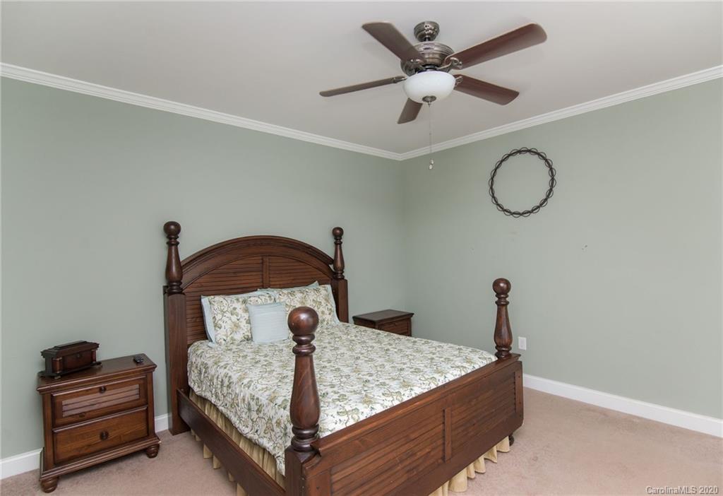 725 Hawley Road McConnells, SC 29726 - Photo 18 of 32 a bed sitting in a bedroom next to a window