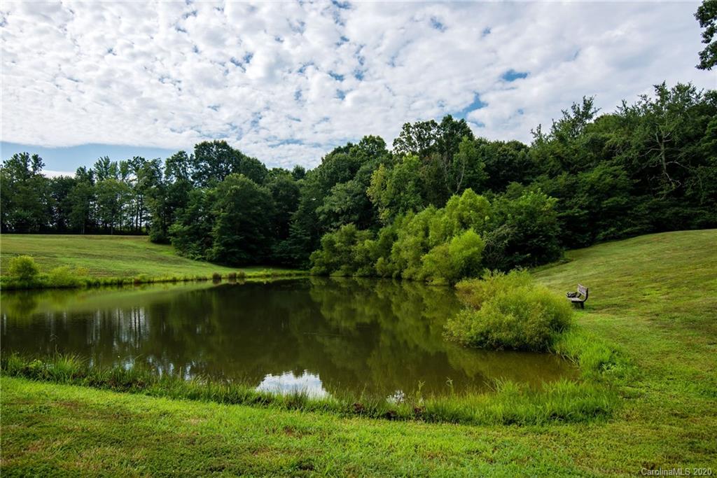 725 Hawley Road McConnells, SC 29726 - Photo 4 of 32 a view of a lake with a yard