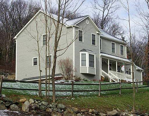 11 Vintage Road Trumbull, CT 06611 - Photo 1 of 1 a front view of a house with garden