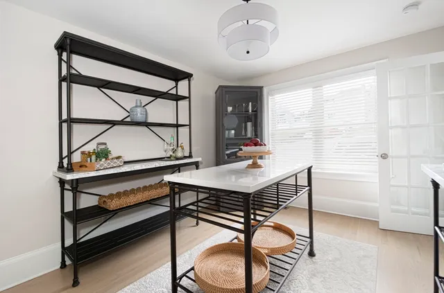 a view of a livingroom with furniture and window