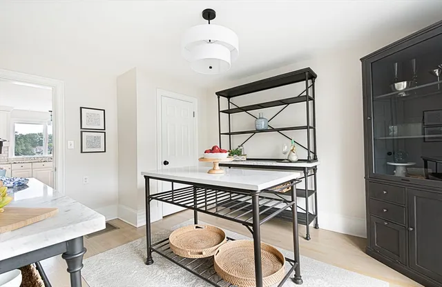 a view of a workspace with furniture