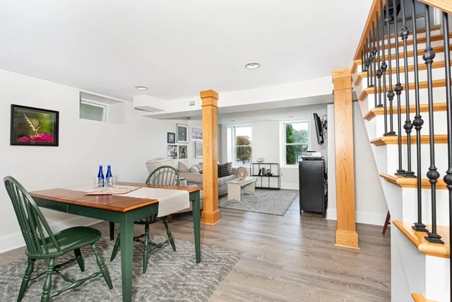 a living room with furniture and a table