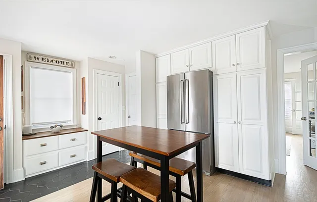 a kitchen with stainless steel appliances a refrigerator and a stove