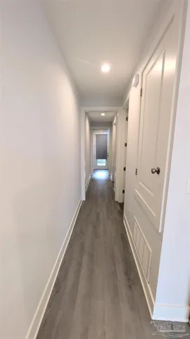 a bathroom with a sink a toilet and shower a mirror