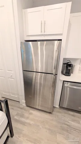a kitchen with granite countertop a stove and a sink
