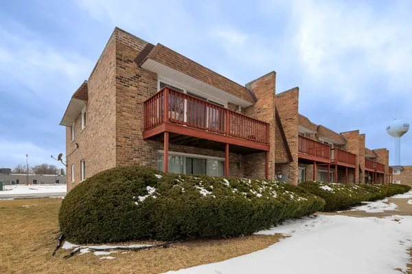 a view of a house with a garden