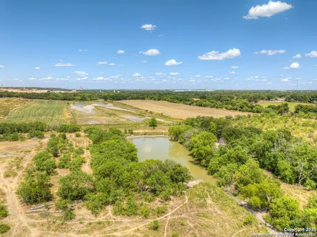 a view of an ocean and a yard