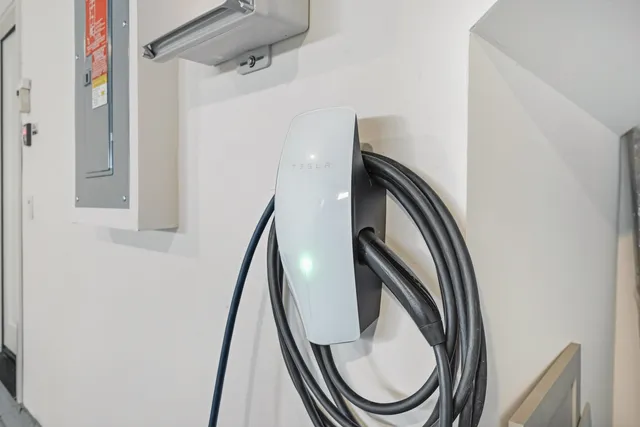 a view of a hallway with washer and dryer