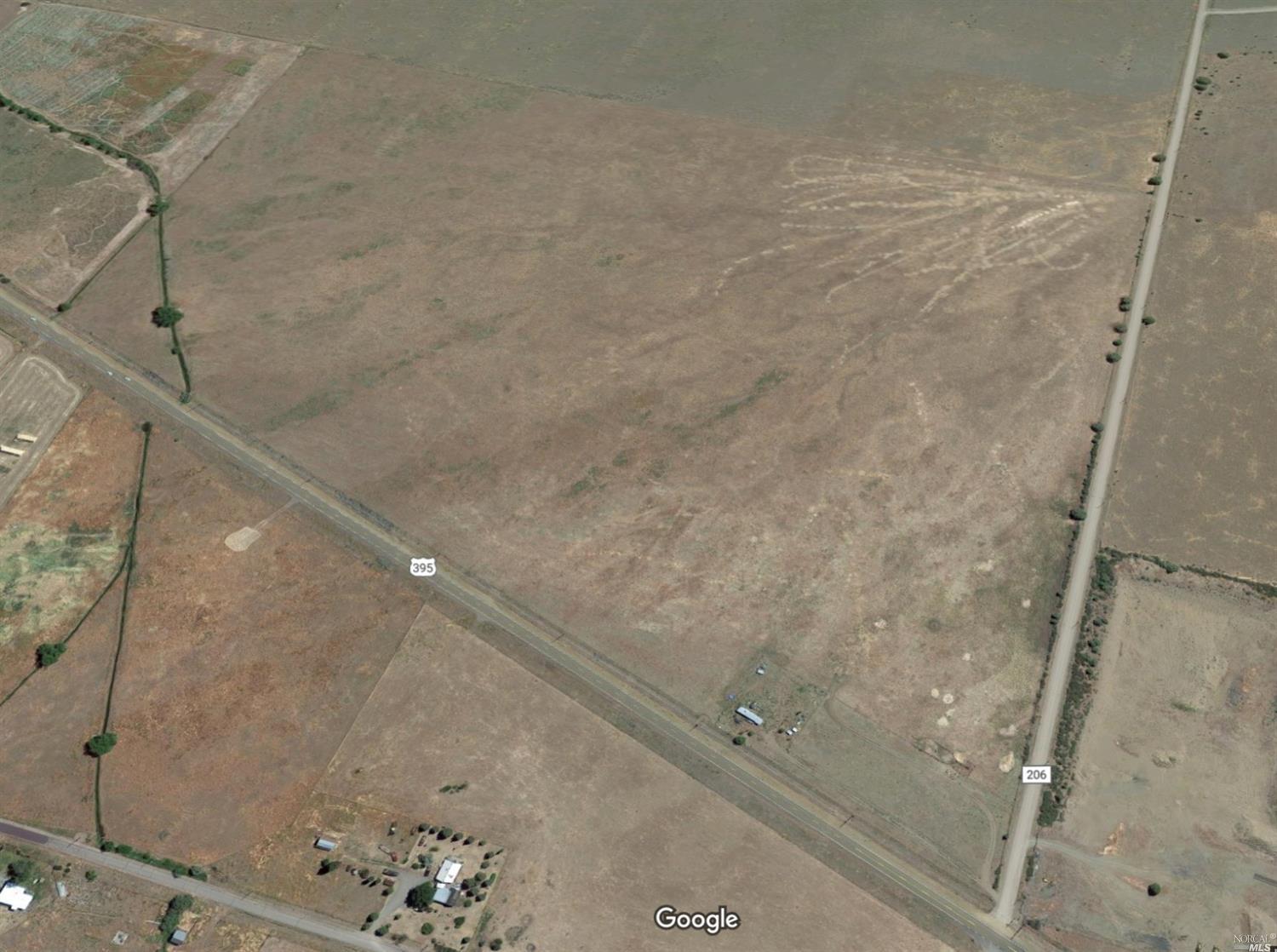 Full 107 acres (all 3 parcels) between US 395 and County Road 206