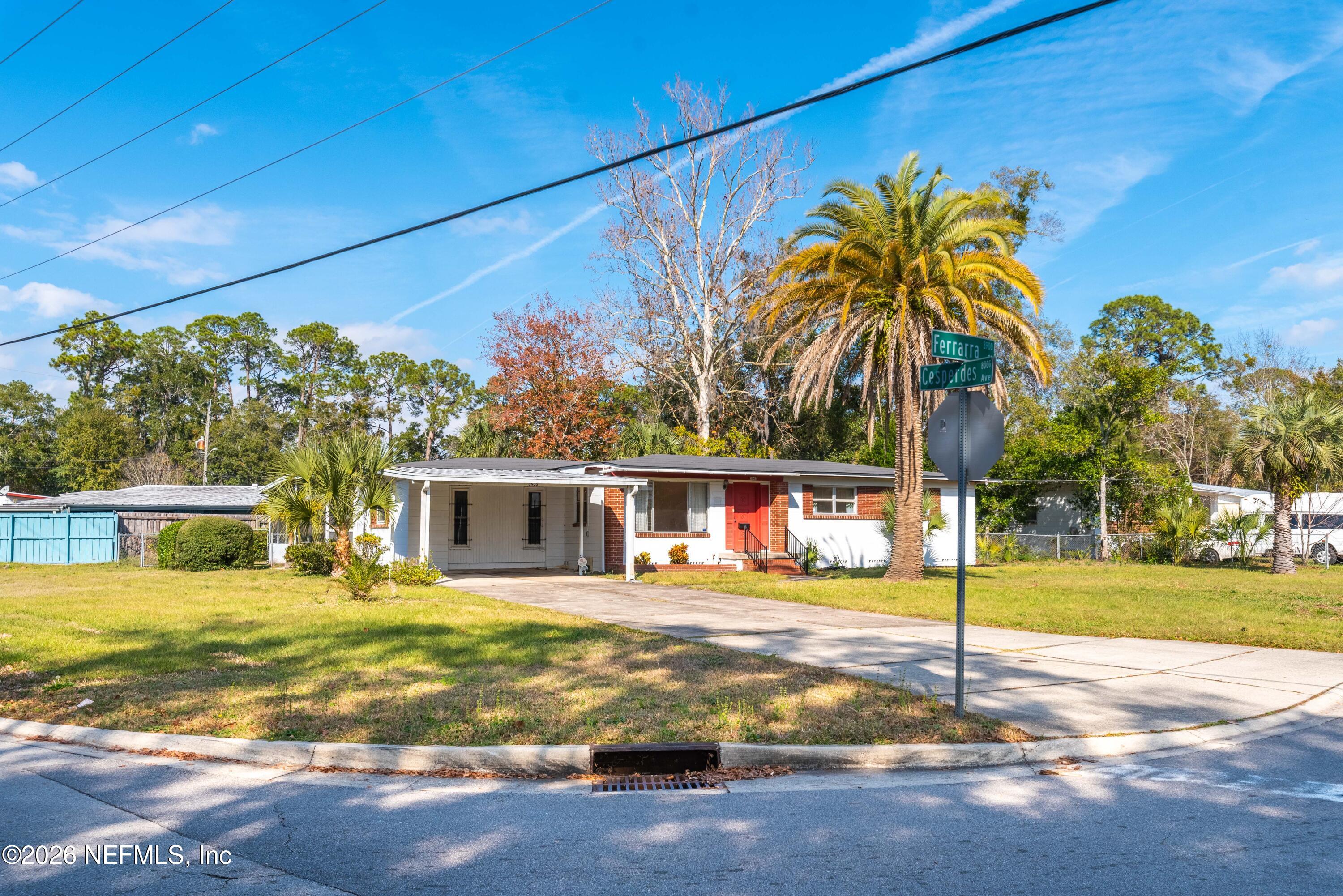 3905 Ferrarra Street Jacksonville, FL 32217 - Photo 25 of 29 a view of a house with a yard