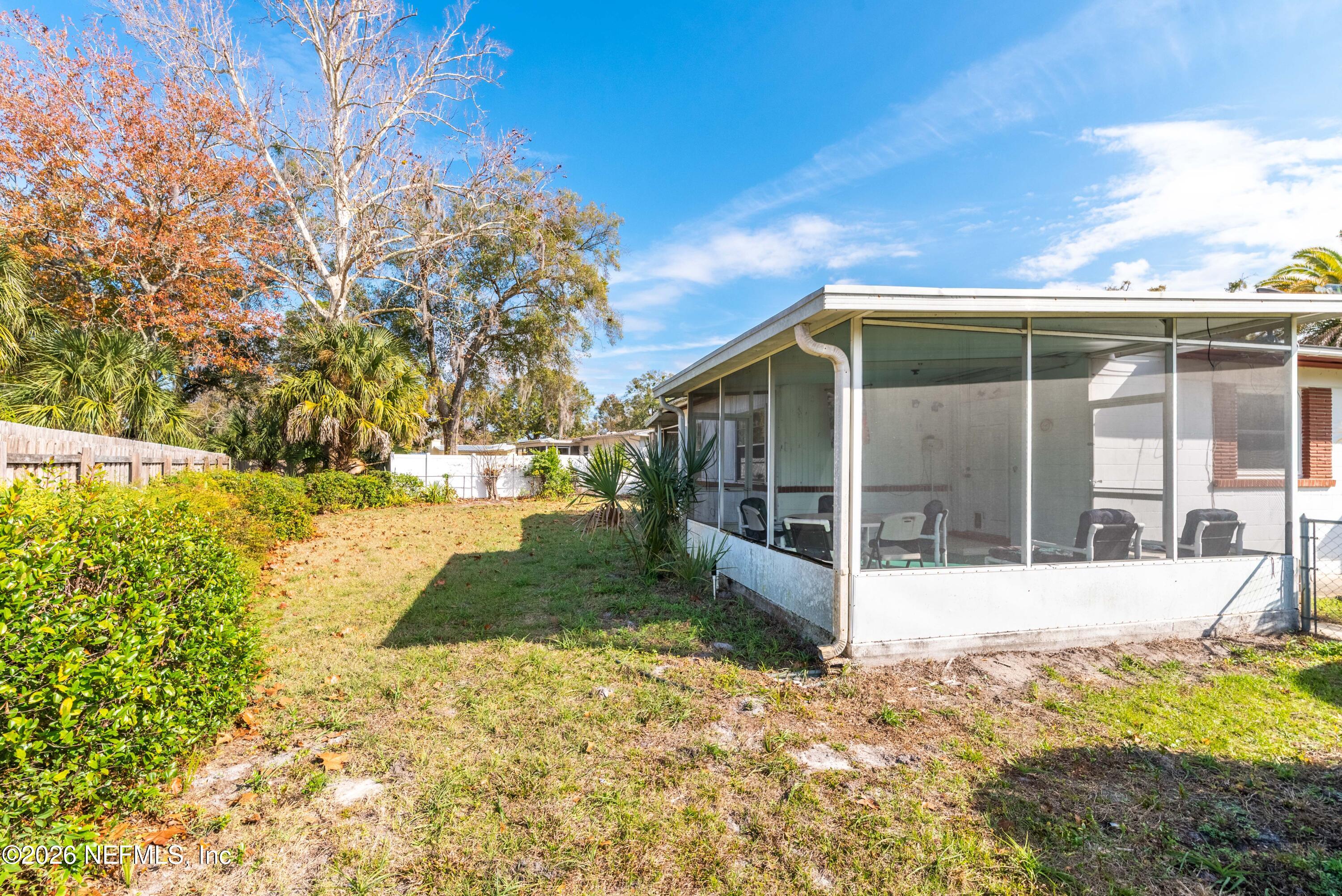 3905 Ferrarra Street Jacksonville, FL 32217 - Photo 26 of 29 a view of a house with snow on the background