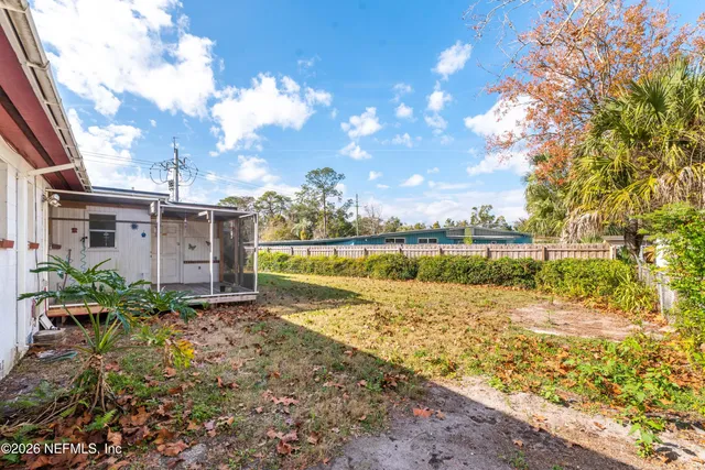 a view of a lake with a big yard
