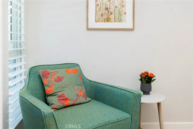 a bathroom with a sink mirror and toilet