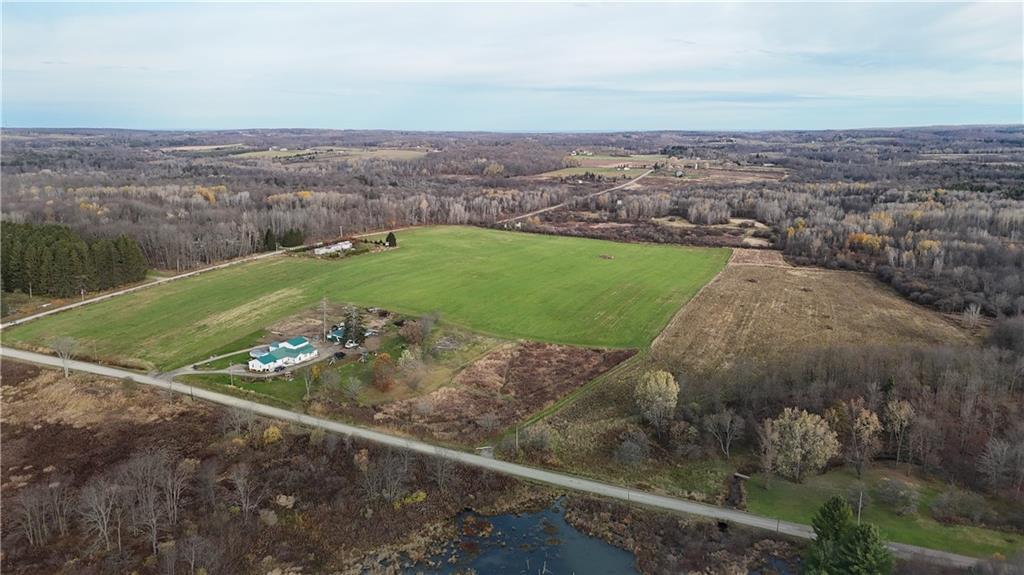 0 Wilson Road North East, PA 16428 - Photo 3 of 12 a view of a street with a grassy area