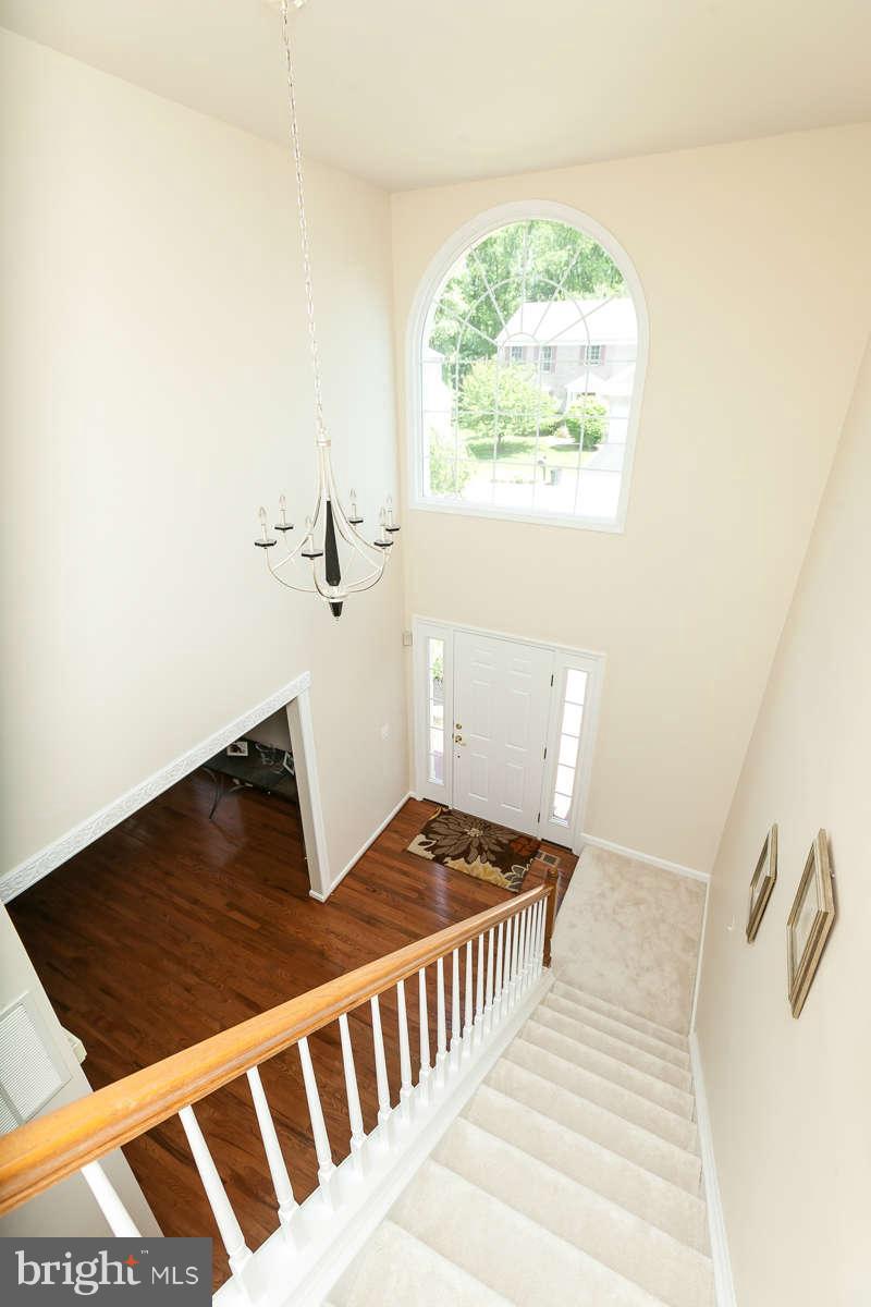 8596 Trail View Drive Ellicott City, MD 21043 - Photo 14 of 29 a view of a room with wooden floor and window