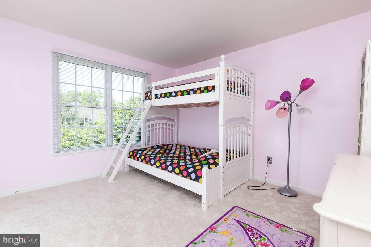8596 Trail View Drive Ellicott City, MD 21043 - Photo 21 of 29 a front view of a bedroom with window and furniture
