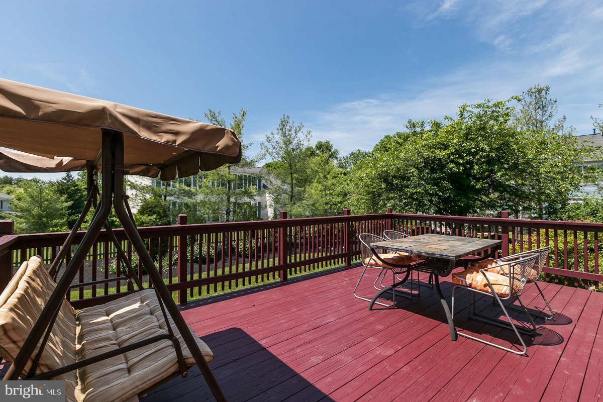 8596 Trail View Drive Ellicott City, MD 21043 - Photo 27 of 29 a view of a chairs on the deck