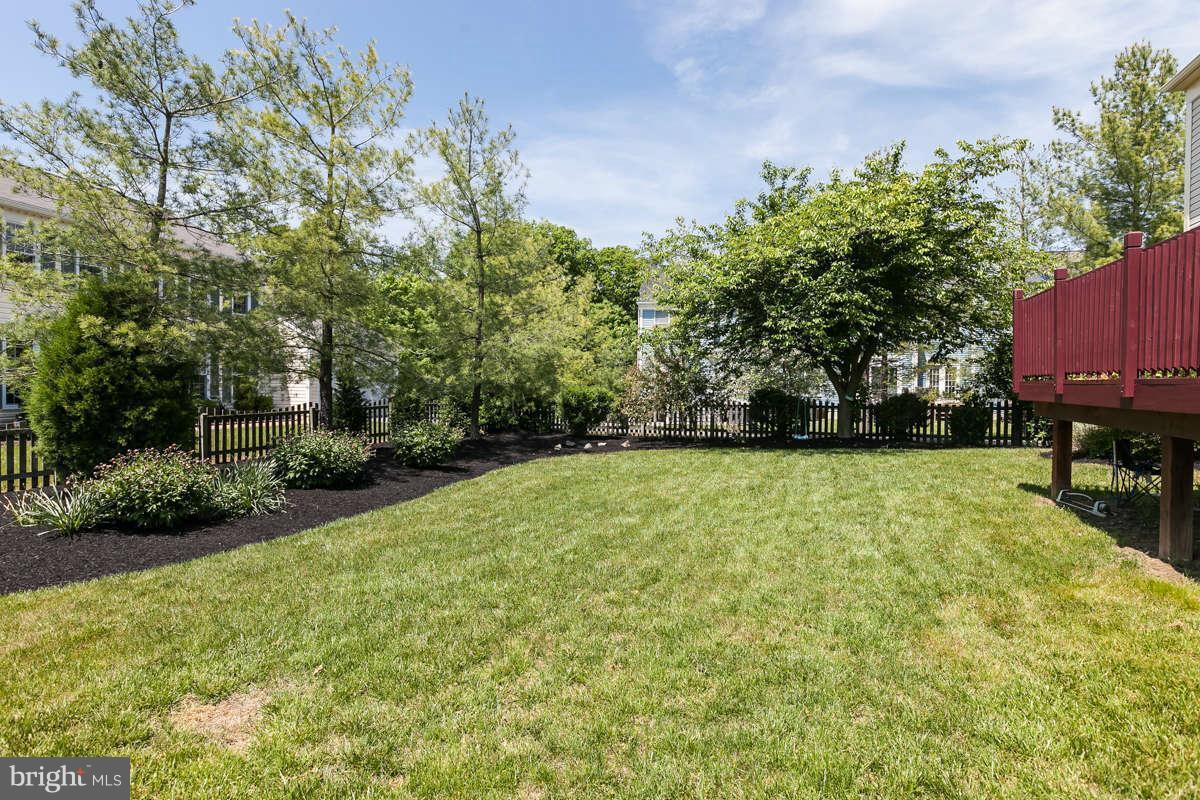 8596 Trail View Drive Ellicott City, MD 21043 - Photo 29 of 29 a view of a yard with a house in the background