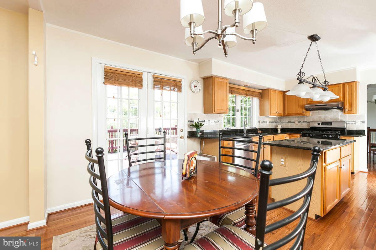 8596 Trail View Drive Ellicott City, MD 21043 - Photo 8 of 29 a dining room with furniture and window