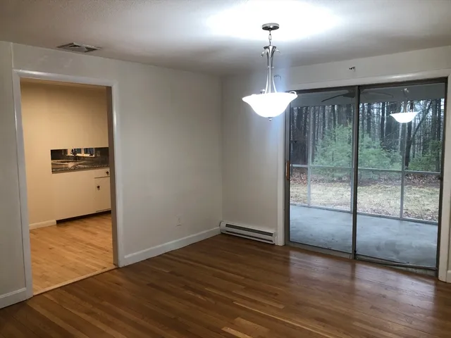 a view of a room with window and pool table