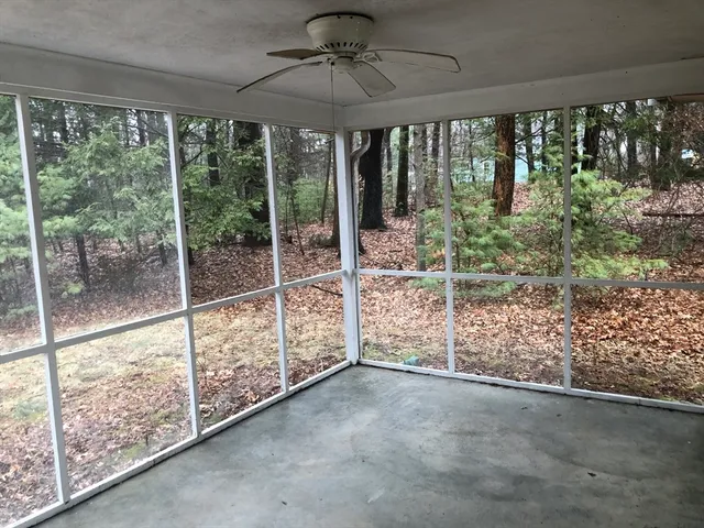 a view of an empty room and window