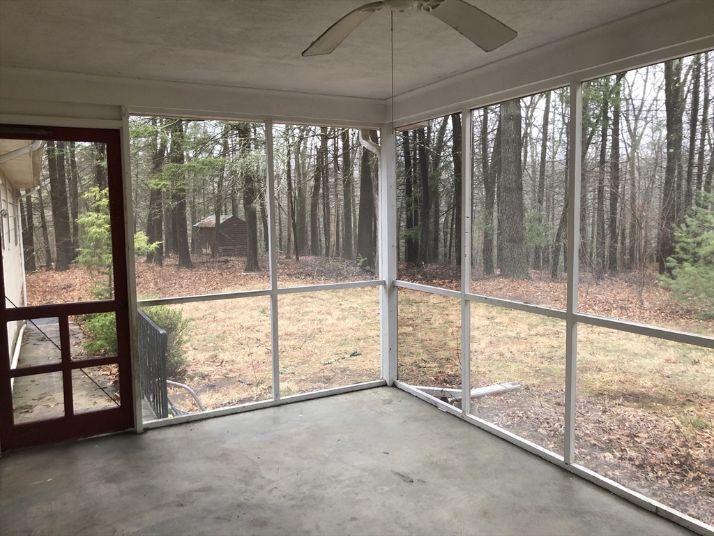 53 Deerhaven Road, Unit 1 Lincoln, MA 01773 - Photo 14 of 42 a view of an empty room and window