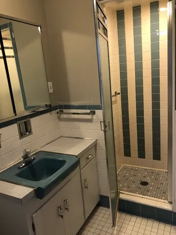 an empty room with a fireplace