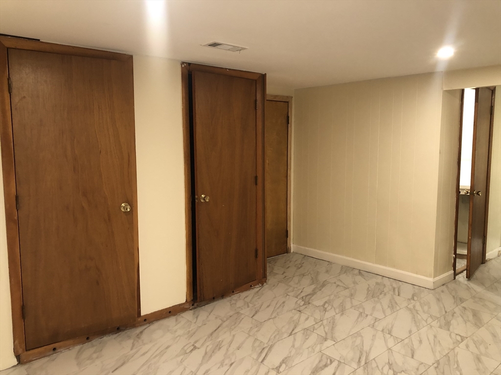 53 Deerhaven Road, Unit 1 Lincoln, MA 01773 - Photo 37 of 42 a view of an empty room