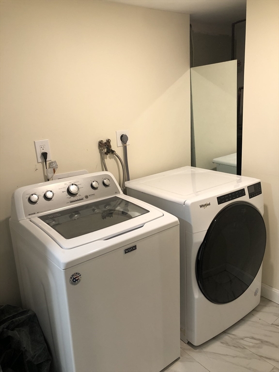 53 Deerhaven Road, Unit 1 Lincoln, MA 01773 - Photo 39 of 42 a utility room with dryer and washer