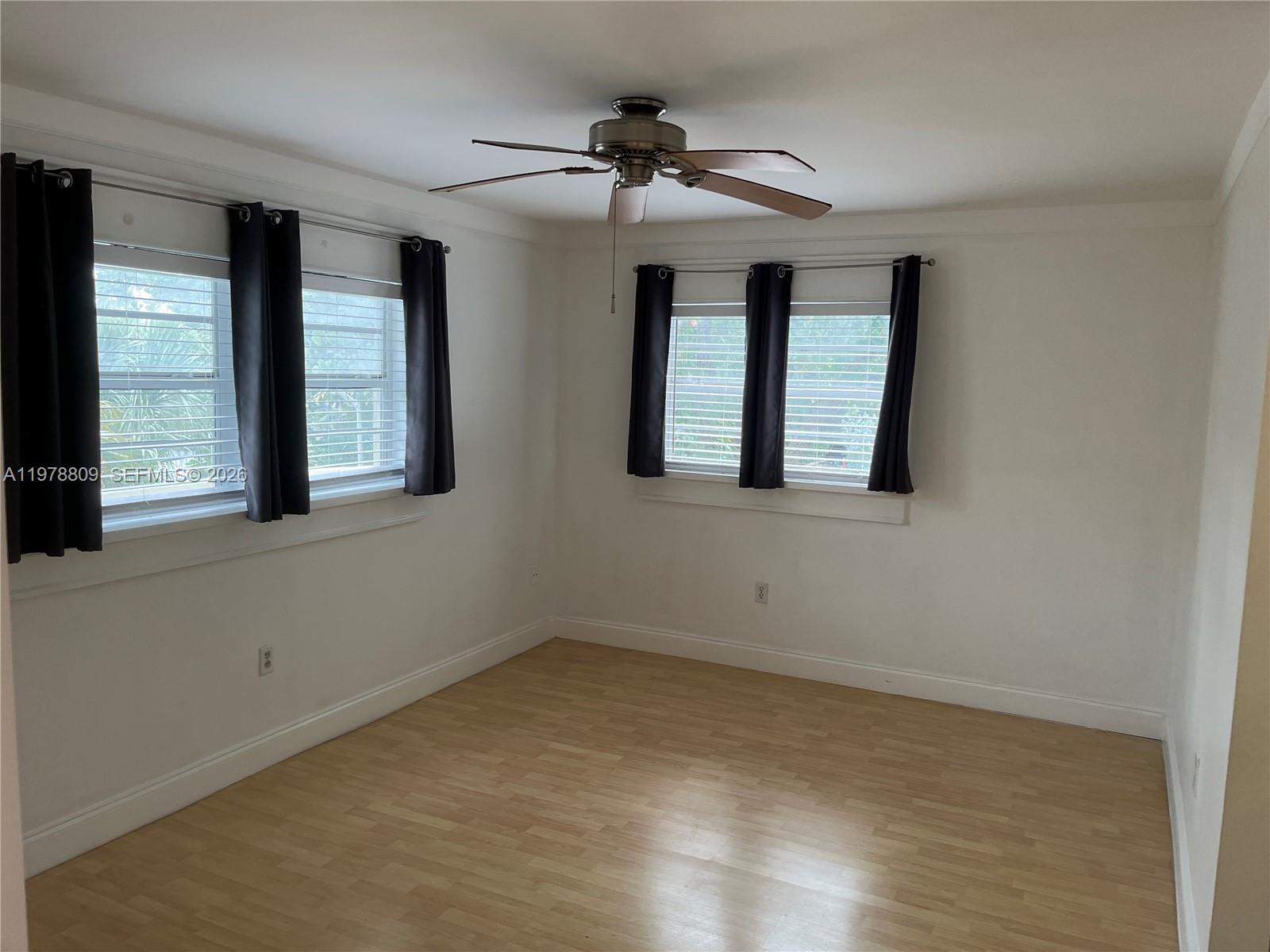 1250 Lincoln Road, Unit 310 Miami Beach, FL 33139 - Photo 17 of 27 a view of an empty room with a window