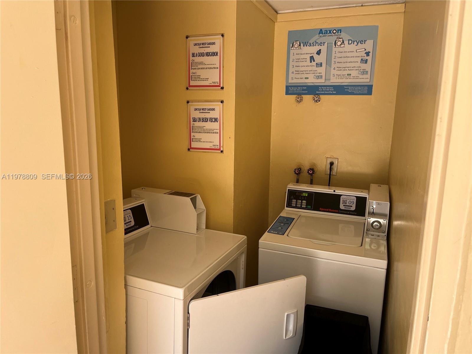 1250 Lincoln Road, Unit 310 Miami Beach, FL 33139 - Photo 26 of 27 a utility room with dryer and washer