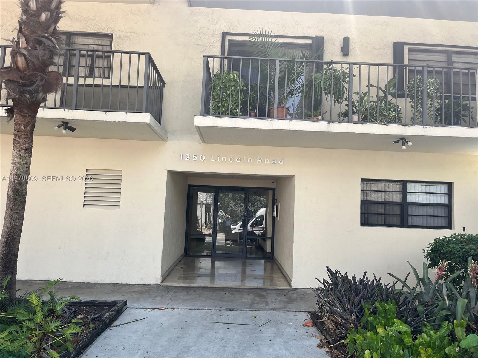1250 Lincoln Road, Unit 310 Miami Beach, FL 33139 - Photo 3 of 27 a view of a building from the roof deck