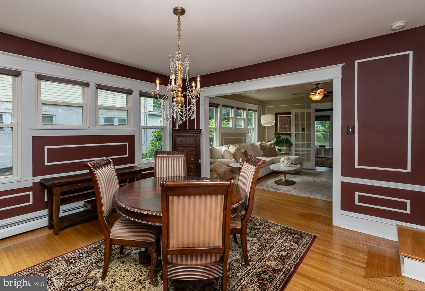 133 Kathmere Road Havertown, PA 19083 - Photo 14 of 45 a living room with furniture and a chandelier