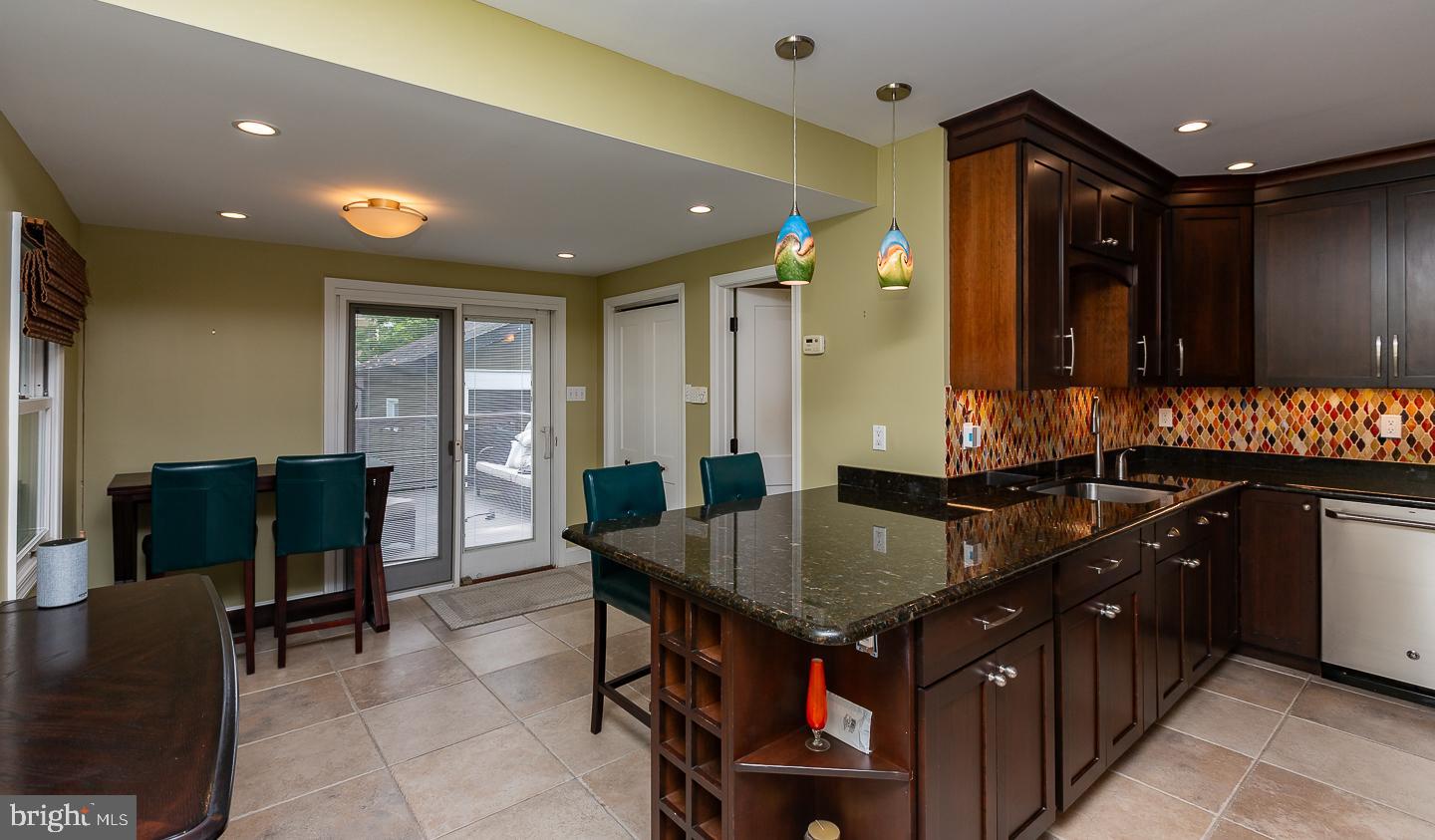 133 Kathmere Road Havertown, PA 19083 - Photo 18 of 45 a kitchen with granite countertop sink table and chairs