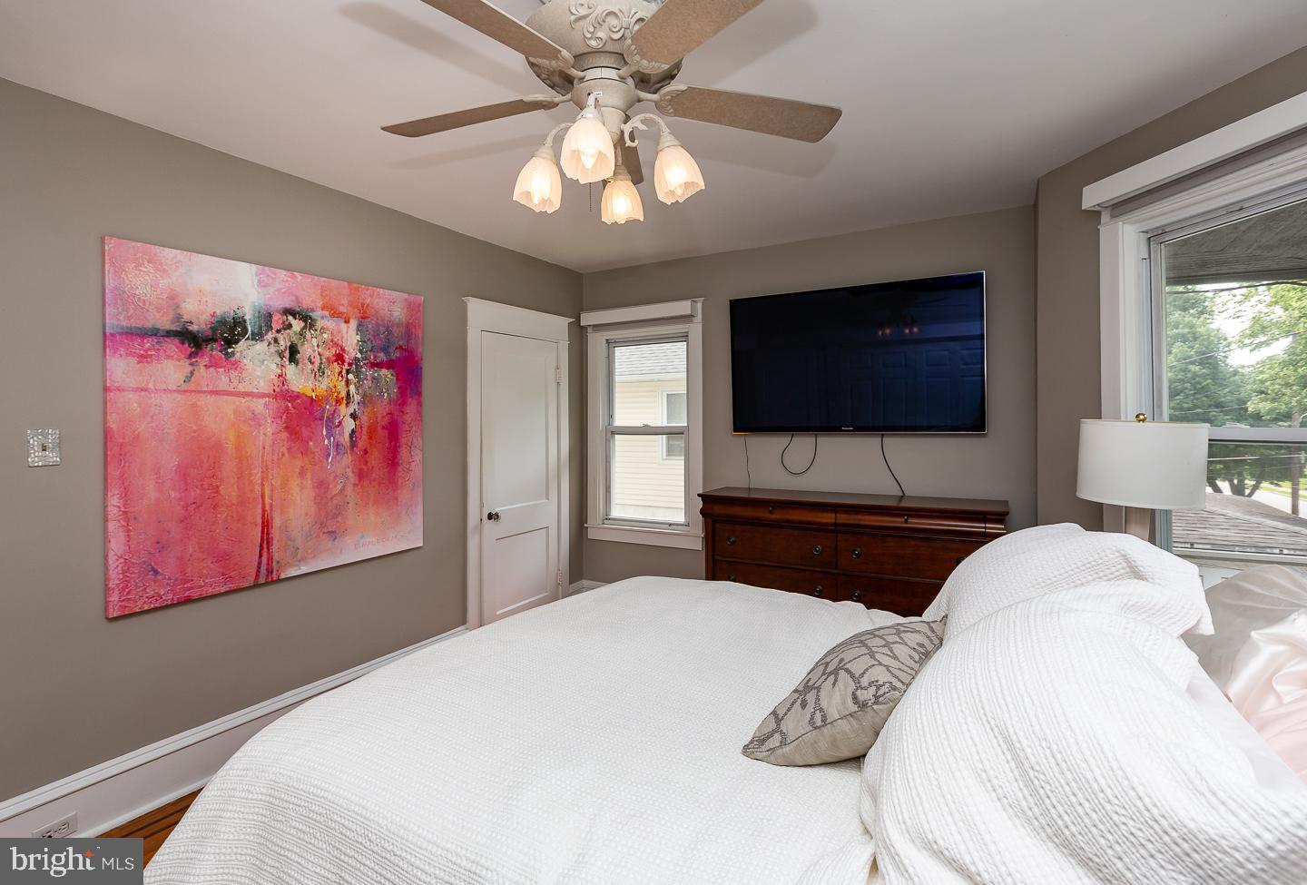 133 Kathmere Road Havertown, PA 19083 - Photo 27 of 45 a bedroom with a bed and a flat screen tv