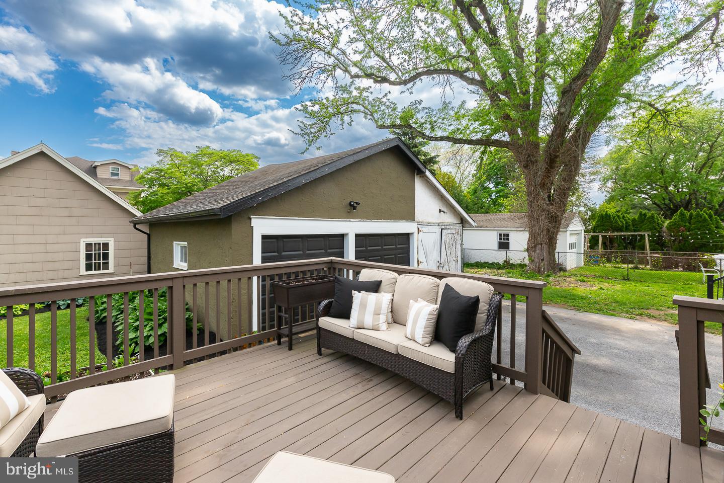 133 Kathmere Road Havertown, PA 19083 - Photo 41 of 45 a view of house with deck and outdoor seating