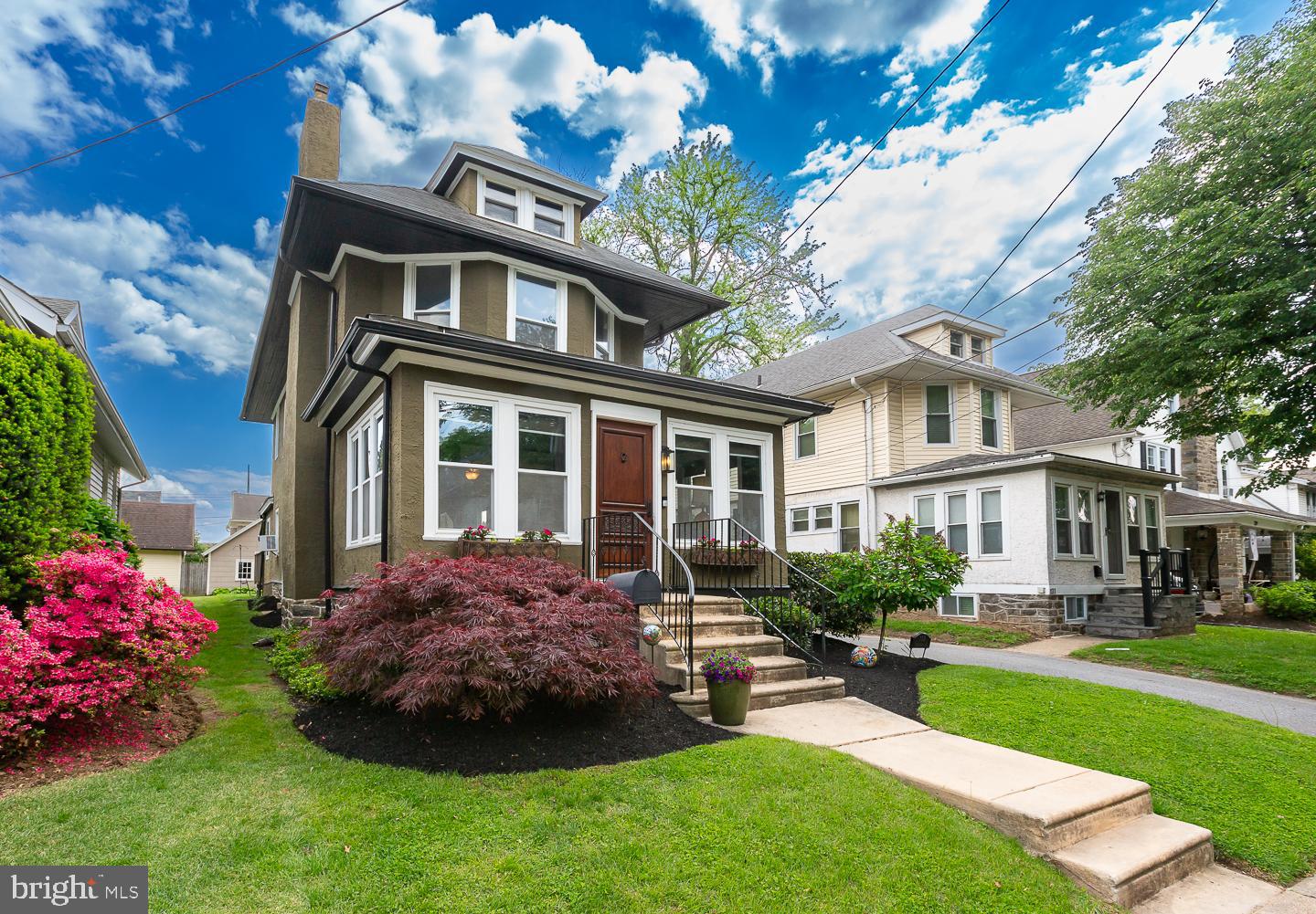 133 Kathmere Road Havertown, PA 19083 - Photo 45 of 45 a front view of a house with a garden and porch