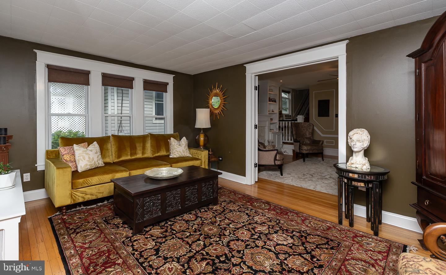 133 Kathmere Road Havertown, PA 19083 - Photo 7 of 45 a living room with furniture and wooden floor