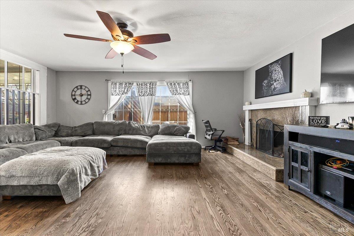 4457 Graywhaler Lane Rohnert Park, CA 94928 - Photo 5 of 51 a bedroom with furniture and a fireplace