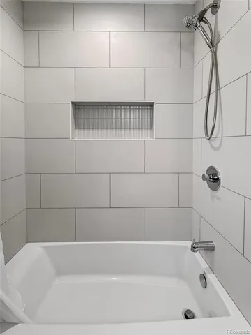 a bathroom with a bathtub