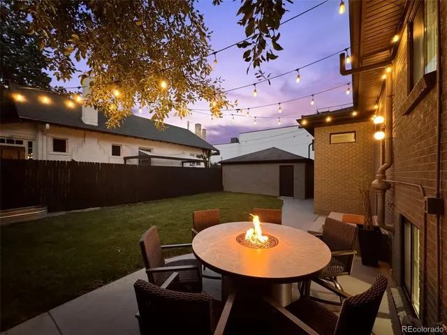 a view of a patio in backyard