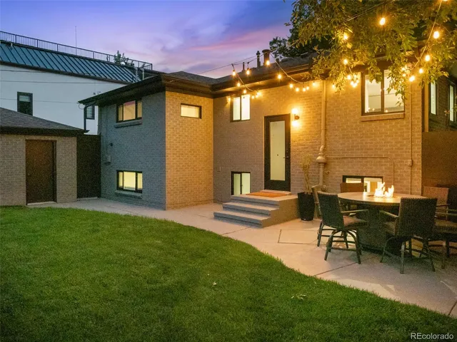 a view of a chair and tables in the patio
