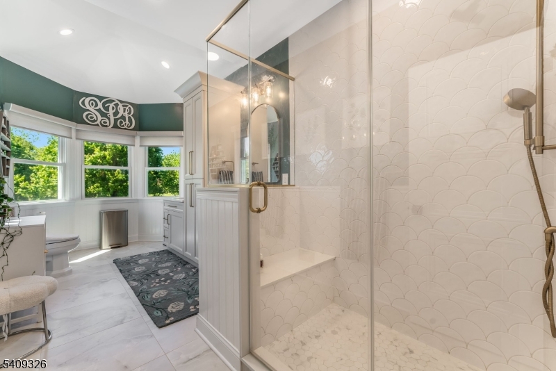 16 Wolverton Road Pittstown, NJ 08867 - Photo 32 of 50 a bathroom with a bathtub and a shower