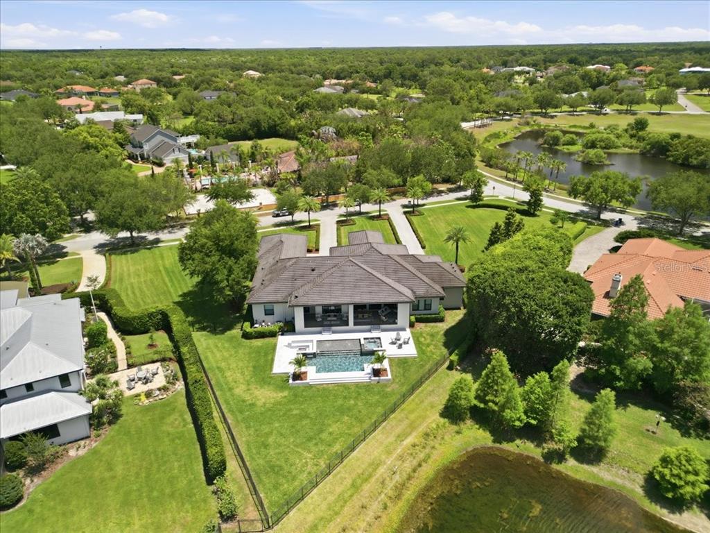 2829 Coastal Range Way Lutz, FL 33559 - Photo 9 of 64 an aerial view of residential houses with outdoor space and lake view