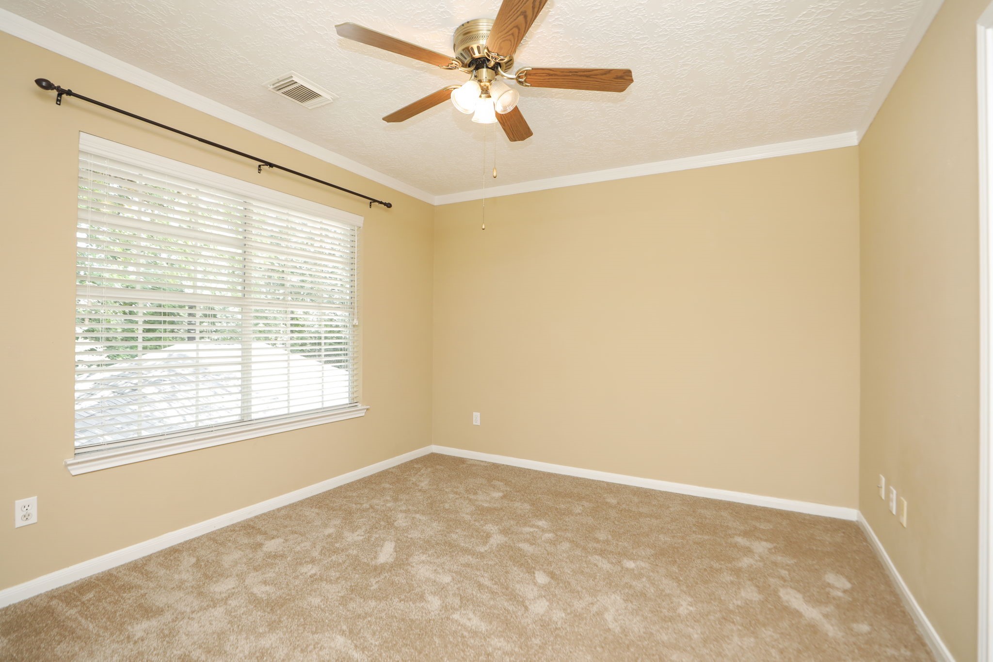 427 West North Hill Drive Spring, TX 77388 - Photo 34 of 41 a view of an empty room with a window