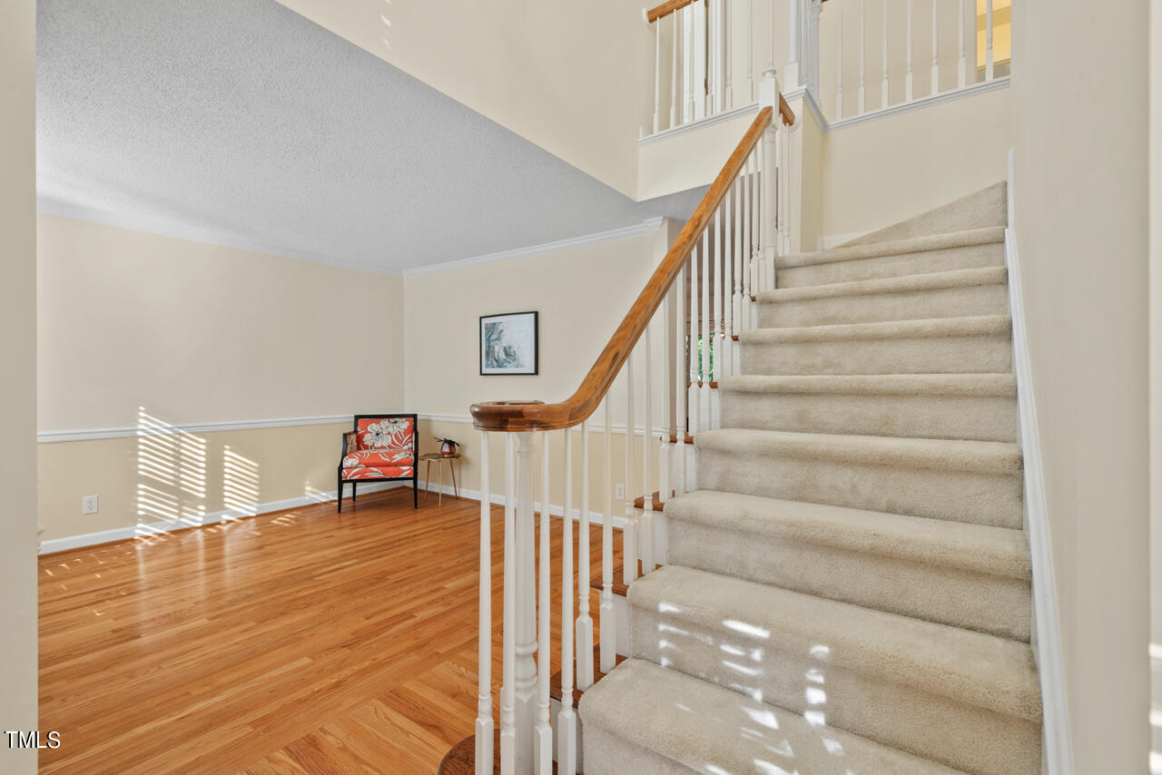 3100 Wilderness Road Durham, NC 27712 - Photo 2 of 35 a view of entryway and hall with wooden floor