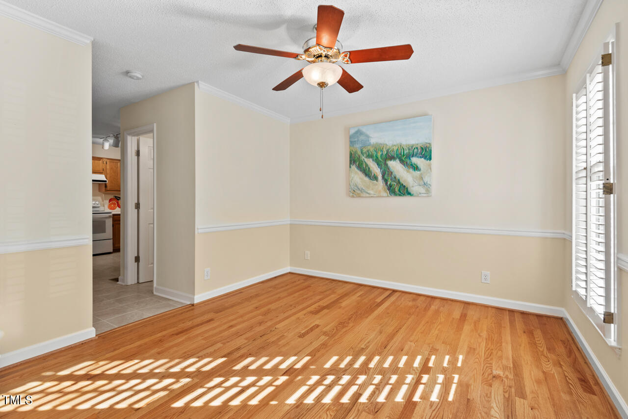 3100 Wilderness Road Durham, NC 27712 - Photo 3 of 35 wooden floor in an empty room with a window