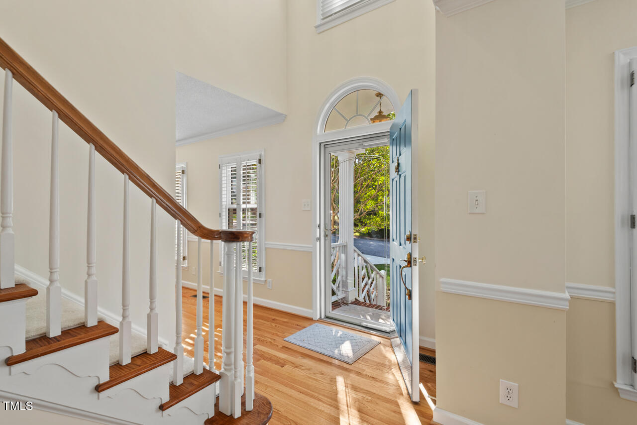 3100 Wilderness Road Durham, NC 27712 - Photo 5 of 35 a view of entryway with wooden floor